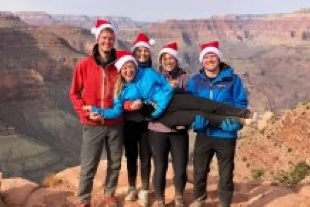Five students in front of Grand Canyon. Photo.