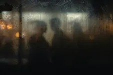 The silhouettes of three people.