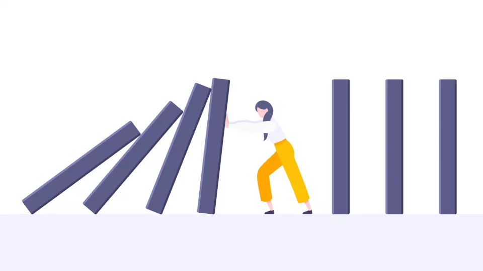 Illustration av en figur som försöker stoppa dominobrickor från att falla.
