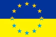 Ukrainas flagga i botten med en ring av stjärnor ovanpå. Motange.